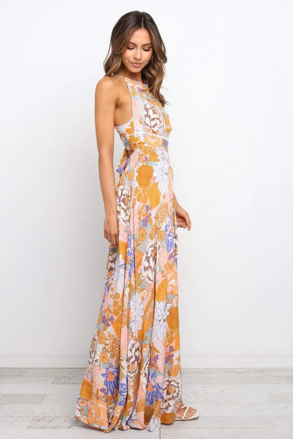 Bohemian Orange Floral Maxi Dress with Backless Detail