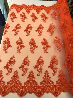 Orange hand beaded floral design embroidery with shiny sequins on a mesh lace-dresses-apparel-fashion-prom-nightgown-sold by the yard.