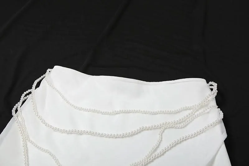 Solid beaded chain mini skirt